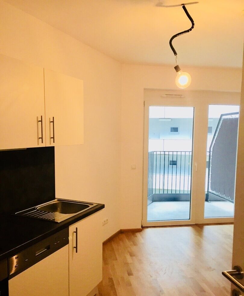 Küche und Wohnraum: Graz-Waltendorf nahe TU · 3 Zimmer auf 45 m² + Balkon · vermietet · 185.000 € netto