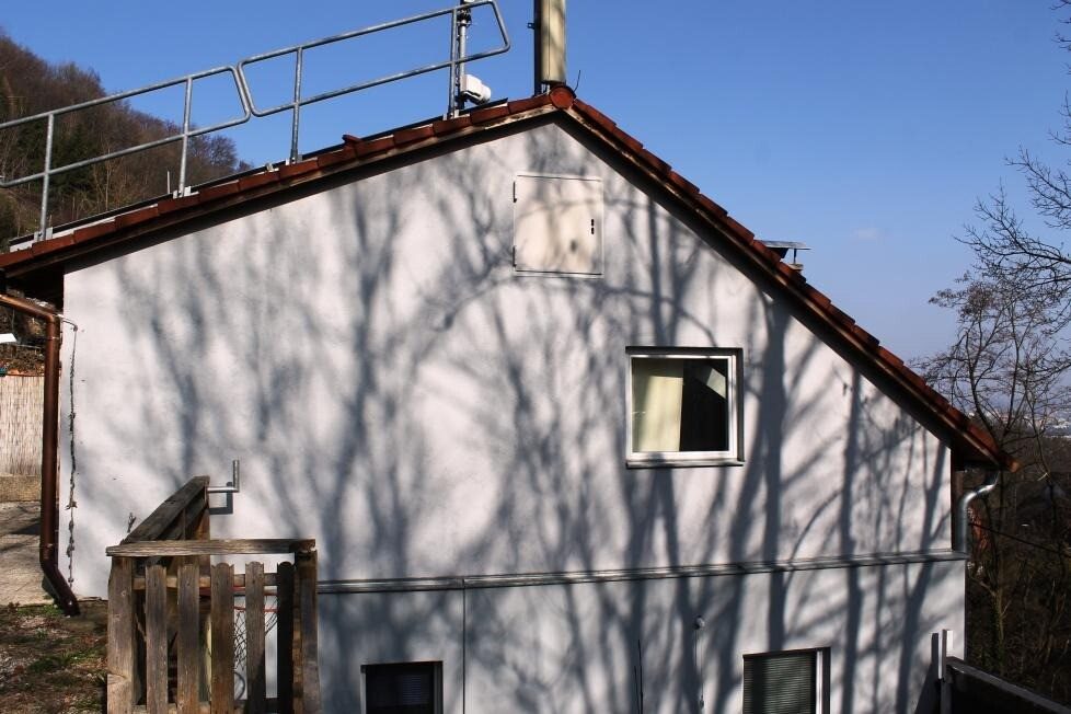 Hausansicht: Graz-West mit Stadtblick · 3 Zimmer 83 m² + 23 m² Terrasse + Parkplatz · vermietet · 6 % Rendite · 96.000 €